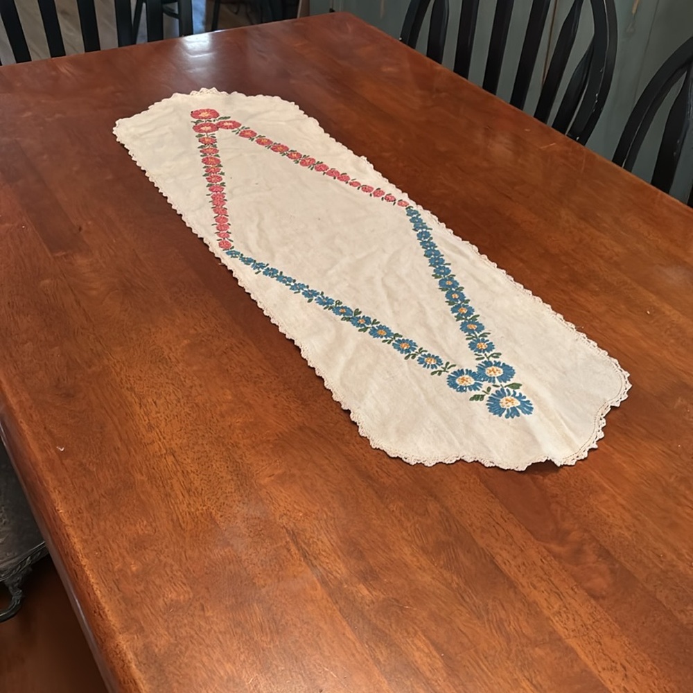 Vintage embroidered table linen runner with blue and pink flowers